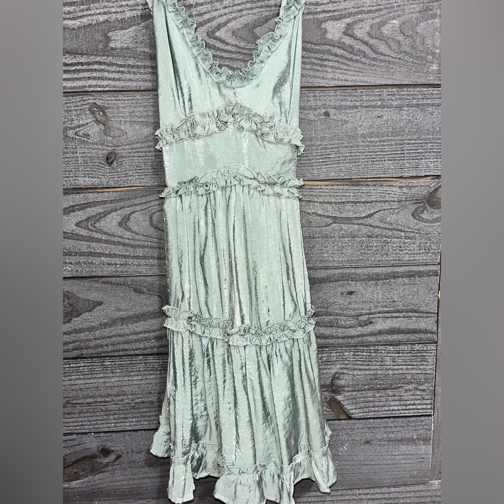 Francesca’s green dress